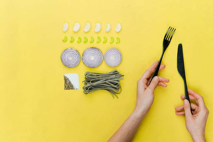 Minimalist food flat lay with ingredients and cutlery