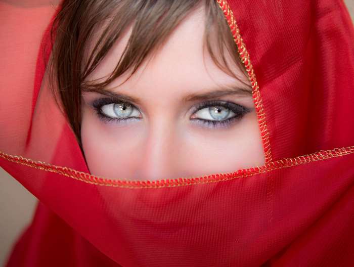 Elegant Woman with Striking Blue Eyes 4K