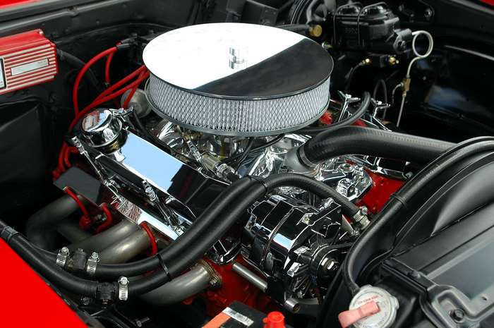 Close-up of a clean, chrome-detailed car engine