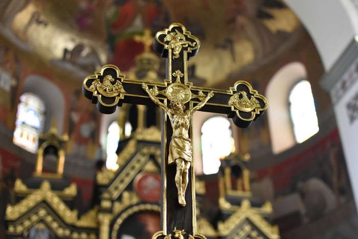 Close up of a golden crucifix in a church