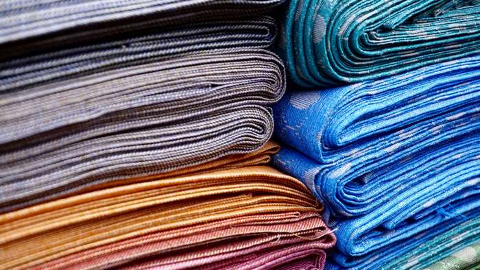 Close up of colorful folded fabrics