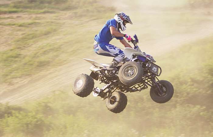 Man on a quad bike jumping