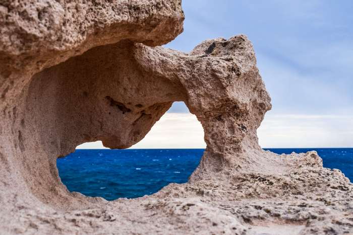 Rock formation window overlooking the sea in Ayia Napa, Cyprus 4K