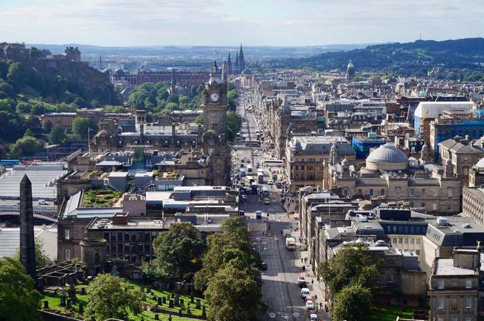 Edinburgh cityscape with Scott Monument and Edinburgh Castle