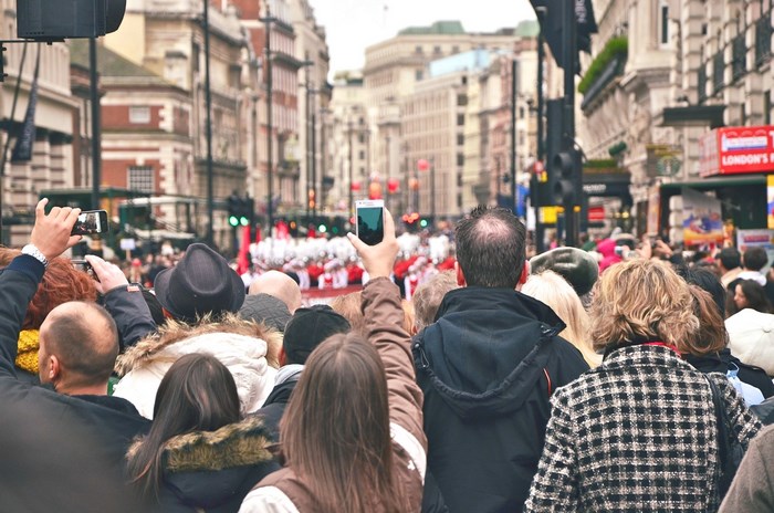 Crowd watching a parade in London