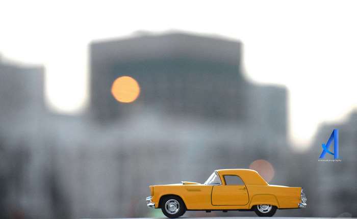 Yellow vintage diecast car photography 4K