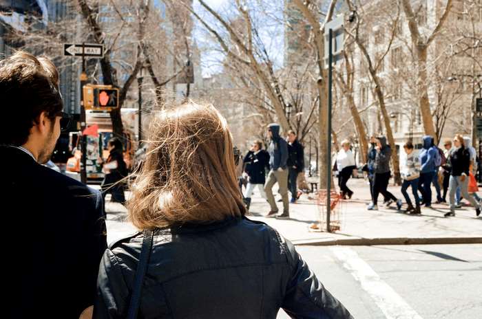 People walking on a sunny city street in New York