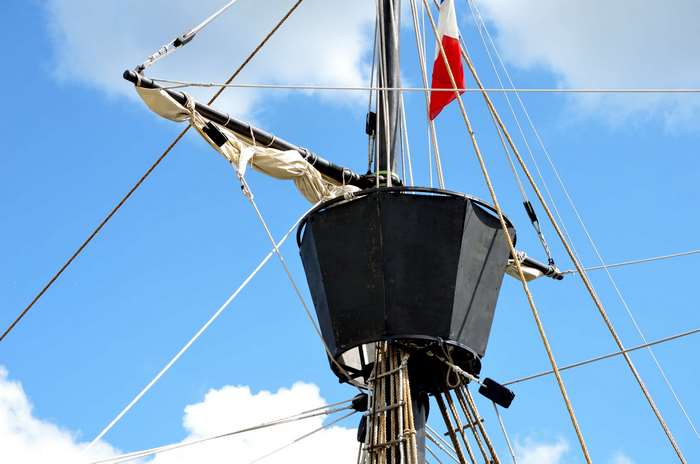 Ship's crow's nest with French flag and rigging