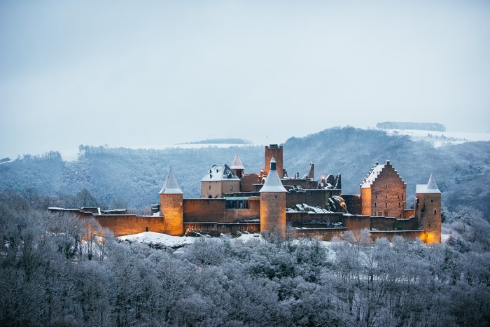Bourscheid Castle in Luxembourg during winter with snow