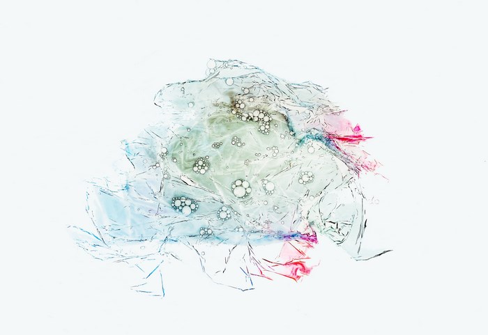 Abstract art of cling film with bubbles and ink