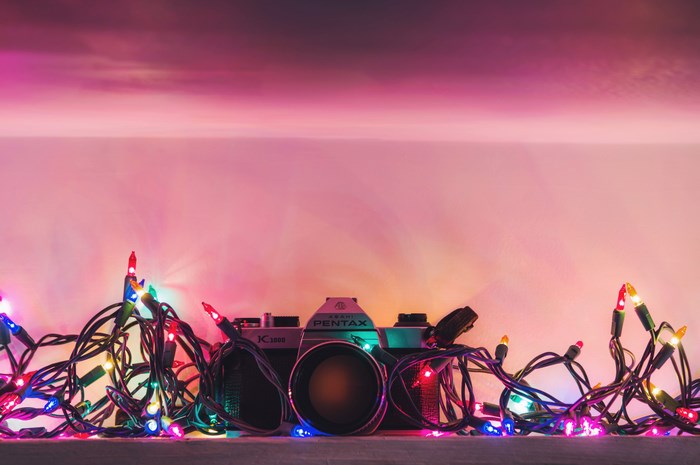 Pentax K1000 camera with Christmas lights