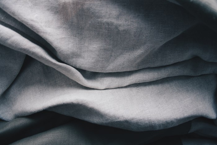 Close-up of draped grey linen fabric