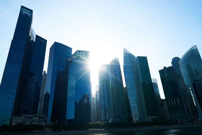 Skyscrapers in Singapore with sun flare
