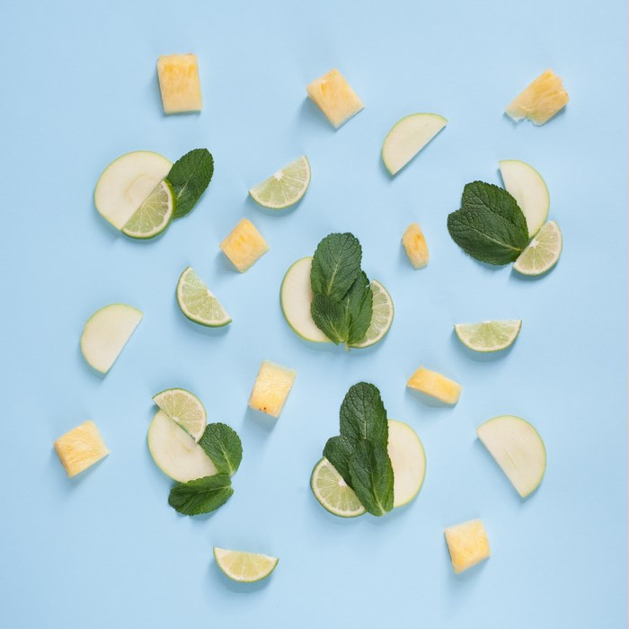 Pineapple, Lime, Apple Slices, and Mint Leaves