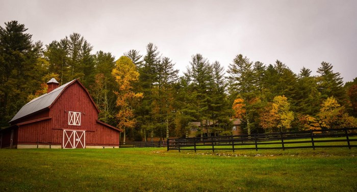 Red barn in a rural autumn landscape