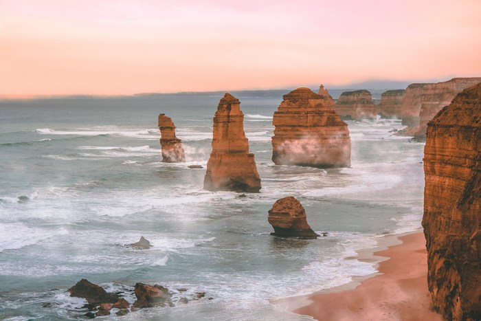 Sunset Over Purple and Orange Coastal Cliffs