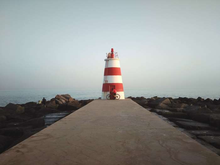 Lighthouse on a pier in Algarve, Portugal 4K