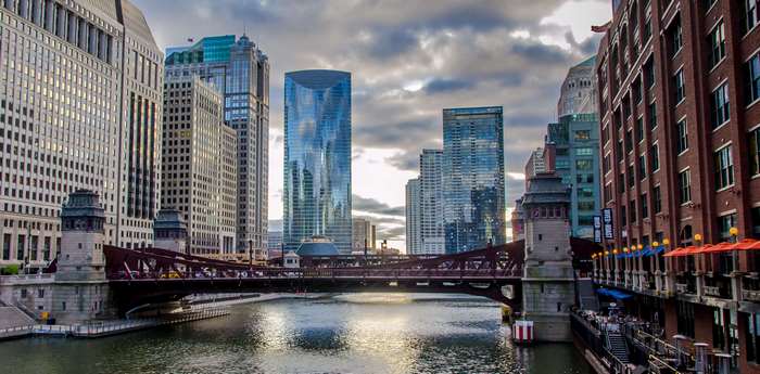 Chicago River cityscape with bridge and skyscrapers 4K