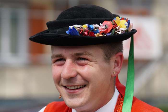 Man in decorated hat at Appenzell Alp Output