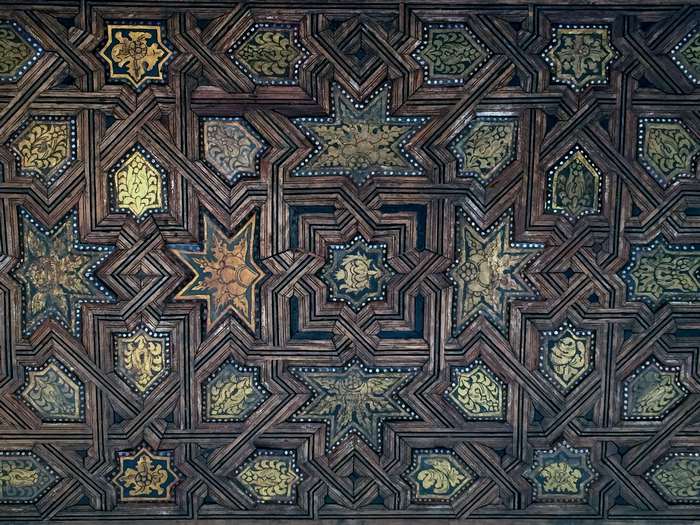 Moorish geometric wooden ceiling with intricate patterns