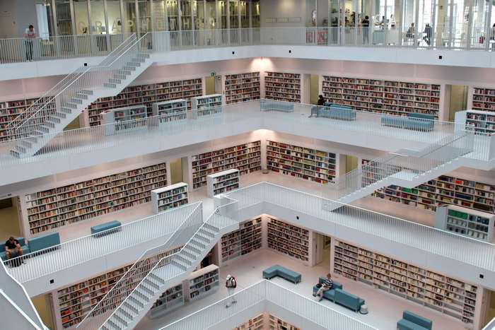 Modern library interior with multiple levels and bookshelves