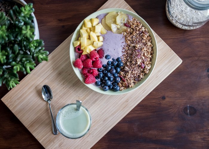 Healthy breakfast bowl with fruits and granola