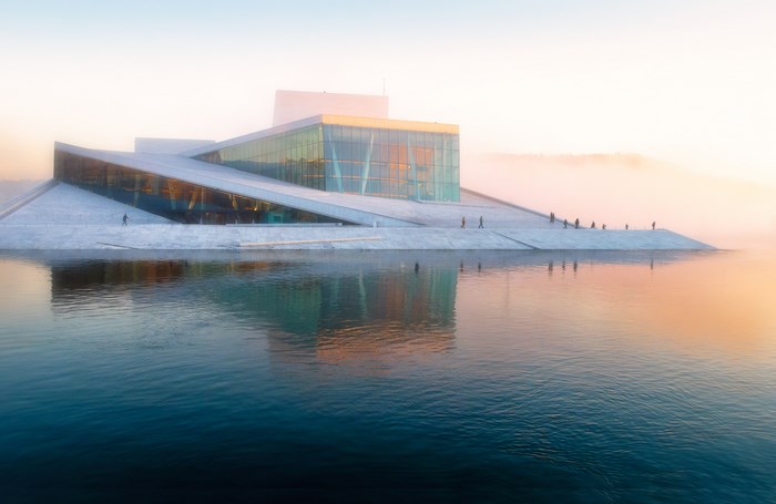 Oslo Opera House in fog with reflections