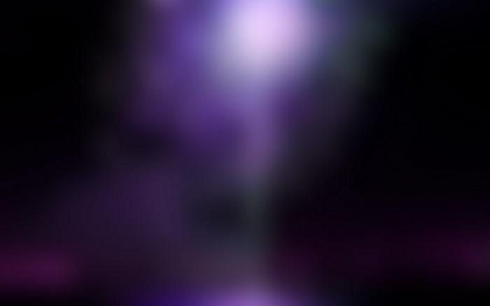 Dark background with purple and white light spots