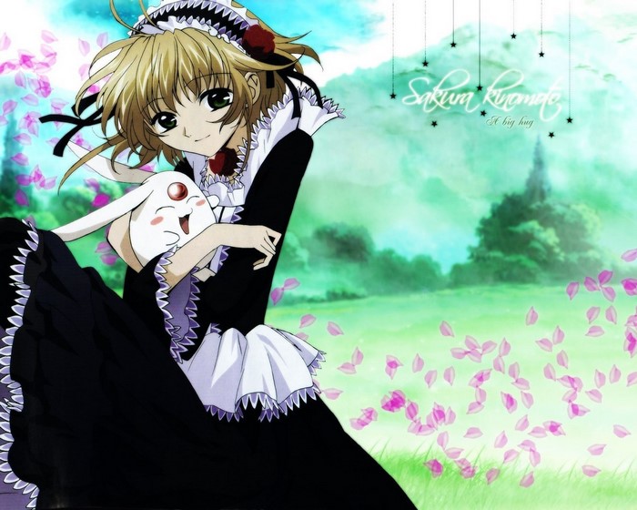 Sakura Kinomoto from Tsubasa Chronicle holding a toy