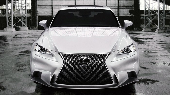 White Lexus ISF parked in an industrial building