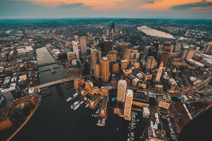 Aerial view of Boston skyline and Charles River at sunset