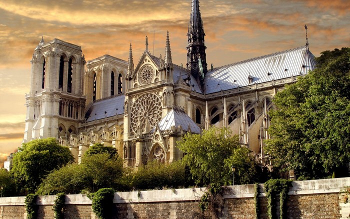 Notre Dame Cathedral Paris with sunset sky