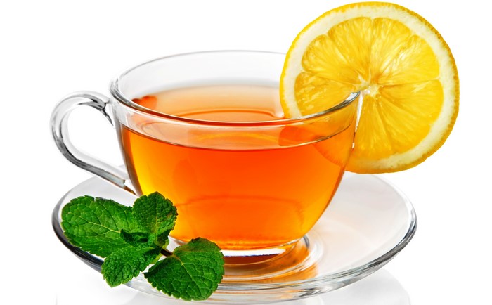 Glass Cup of Tea with Lemon and Mint