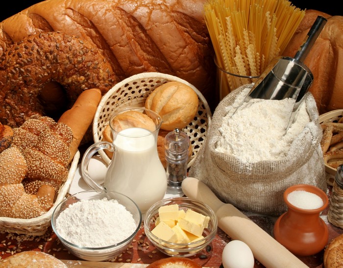Assortment of Bread, Rolls, Pasta, Flour, Milk, Butter, and Sugar