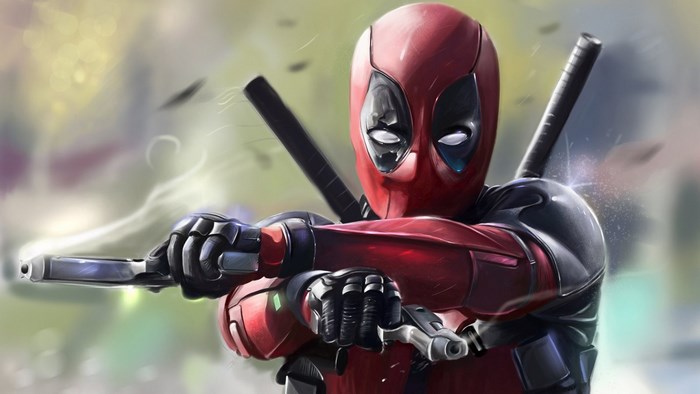 Deadpool in Action with Guns Drawn