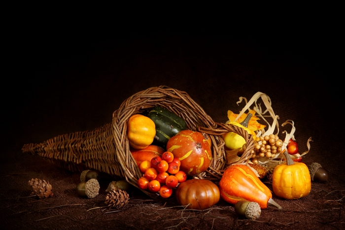 Cornucopia filled with pumpkins and gourds