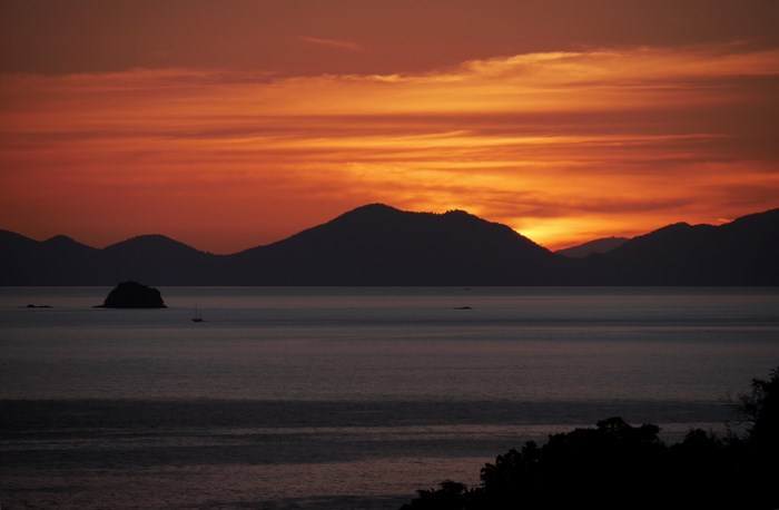 Sunset over the ocean with islands in Krabi, Thailand