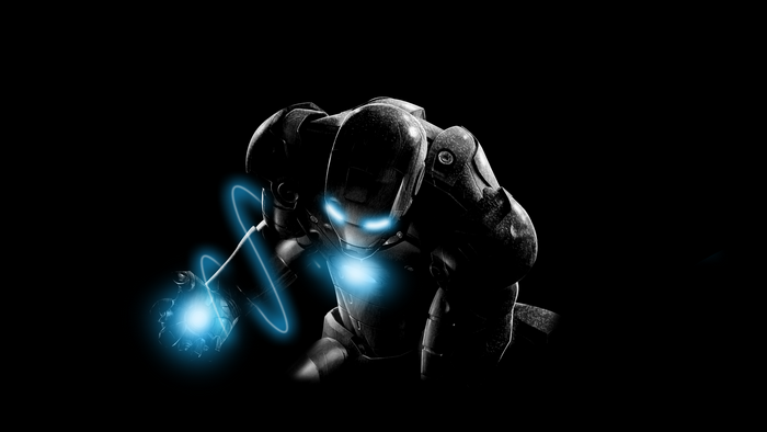 Iron Man in dark suit with blue energy