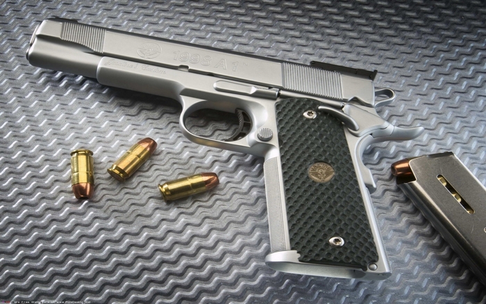 Colt 1911 A1 pistol with ammunition