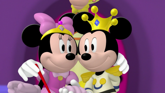 Minnie Mouse and Mickey Mouse wearing crowns