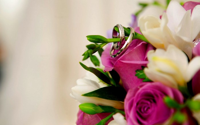 Wedding Rings on a Floral Bouquet
