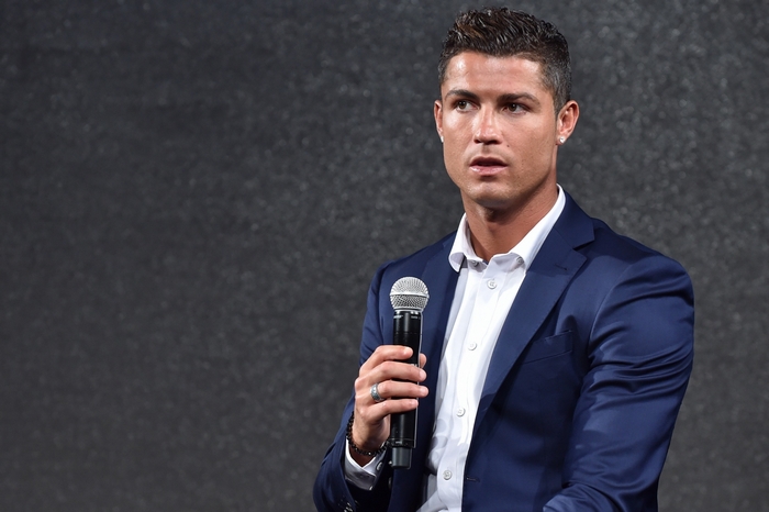 Cristiano Ronaldo holding a microphone