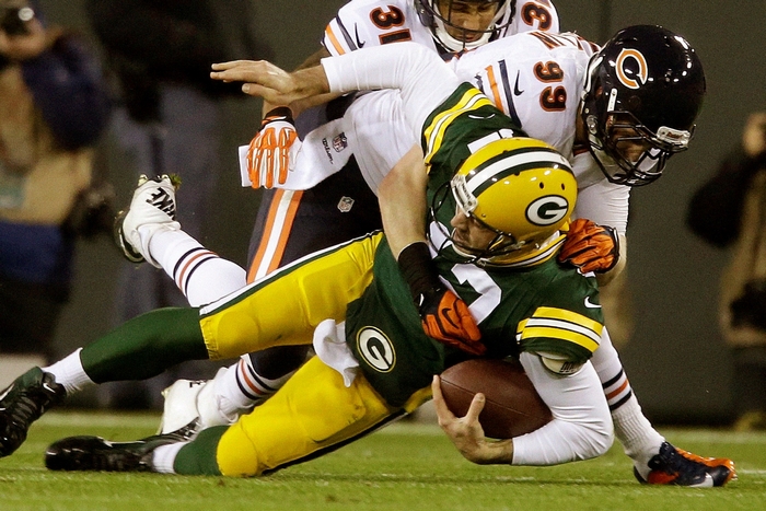 Aaron Rodgers sacked by Chicago Bears players