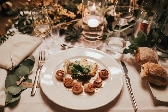Scallops and bread served at a wedding reception
