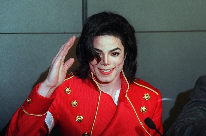 Michael Jackson wearing a red military-style jacket