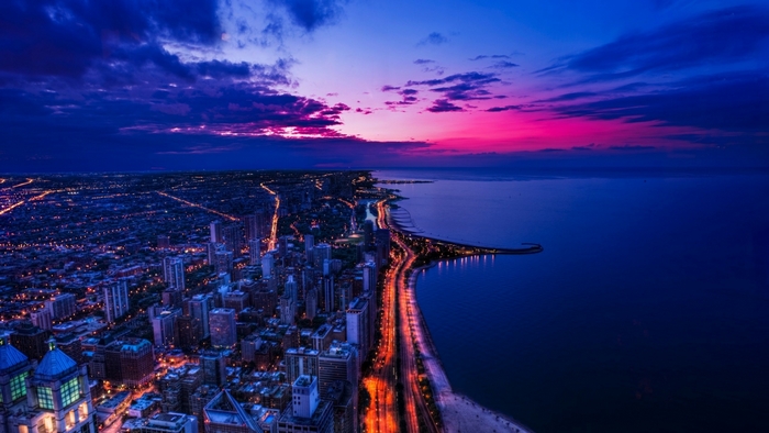 Chicago skyline at dusk over Lake Michigan