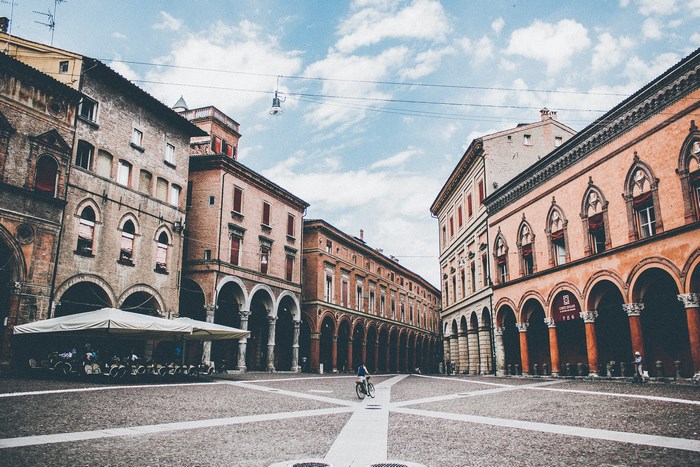 Piazza Maggiore in Bologna, Italy with a cyclist