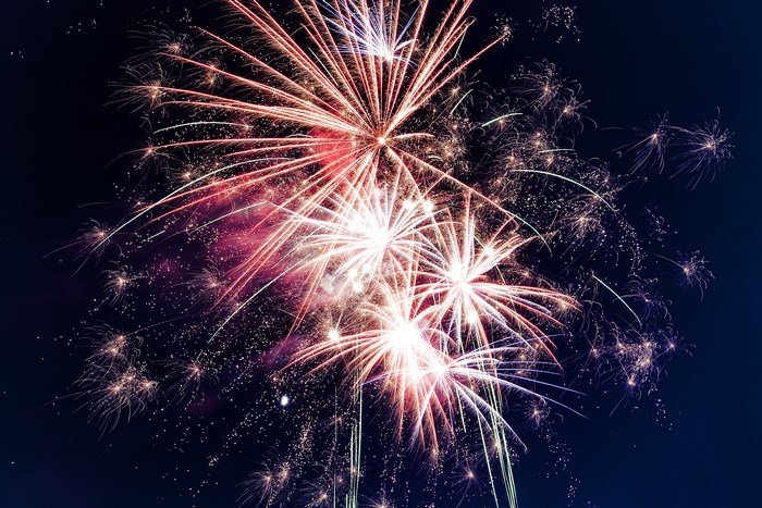 Fireworks exploding in the night sky