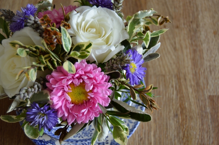 Vintage flower arrangement in a blue and white vase