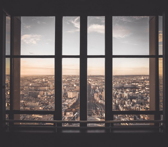 Cityscape View Through Large Window Frame
